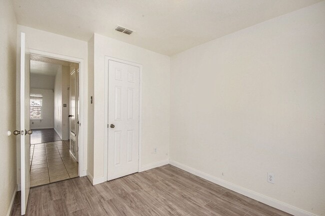 Building Photo - Welcome to this charming 4-bedroom, 2-bath...