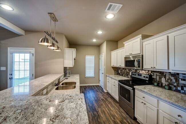 Building Photo - Available August 2026!! Luxury Townhome wi...