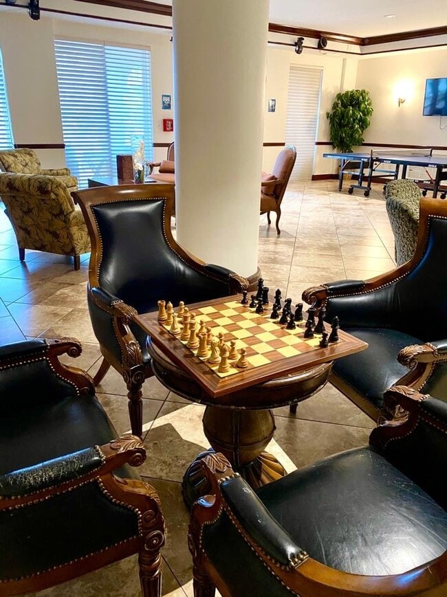 Building Photo - Rare 2/2 Corner Penthouse with Panoramic Lagoon Views from Every Room – Available Now!