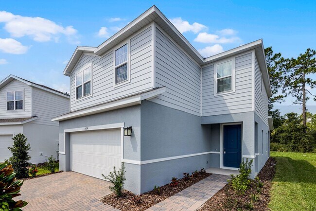 Building Photo - Brand-New 4BR Home with Tile Floors & Quar...