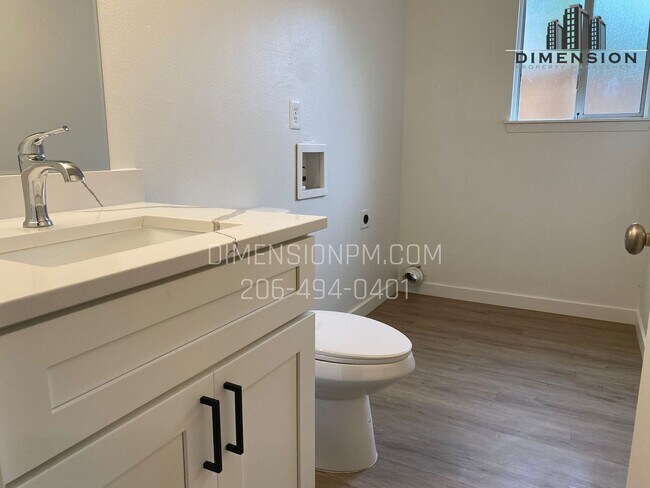Building Photo - Stylishly Renovated Home with Private Back...