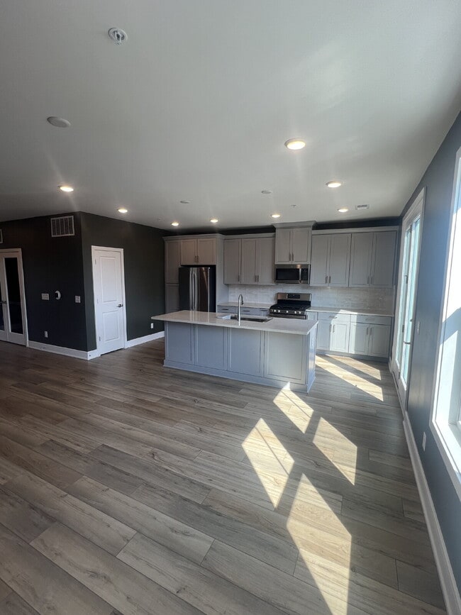 Building Photo - Brand-New Luxury 3BR Townhome-Style Condo ...