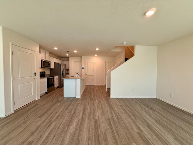 Building Photo - Brand-New Townhome for Rent in the Highly ...