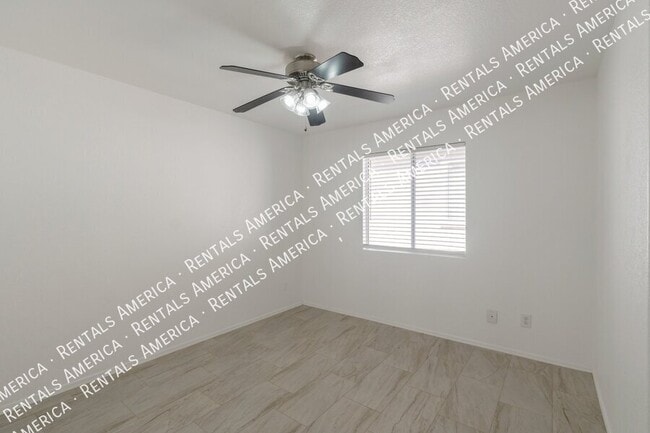 Building Photo - 5573 W Dove of Peace Dr