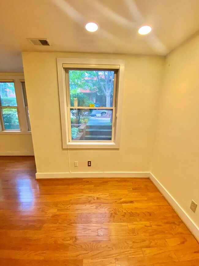 Building Photo - SAVE OVER $200!* Dupont Circle 1 Bedroom Charmer with Patio, Fireplace, Central Air, Washer/Dryer!