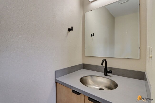 Building Photo - Spacious and bright condo located in a quiet area that boasts the perfect combination of style an...