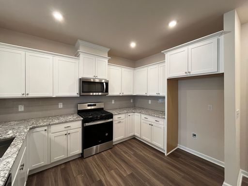 Building Photo - Excellent 3BD, 2.5BA End Unit Raleigh Townhome with 2-Car Attached Garage Near Desirable Amenities