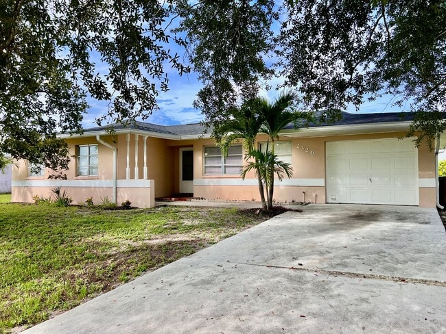Building Photo - Live Comfortably in SE Cape Coral – Bright, Remodeled Home for Rent