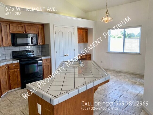 Building Photo - $2,395  Willow and Herndon, 4 Bedroom,  - ...