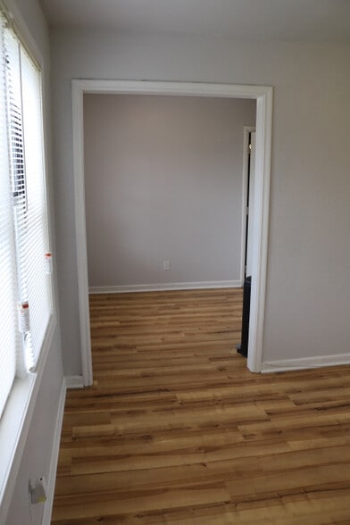 View of living room and dining area from front door - 1439 N Olympia Ave