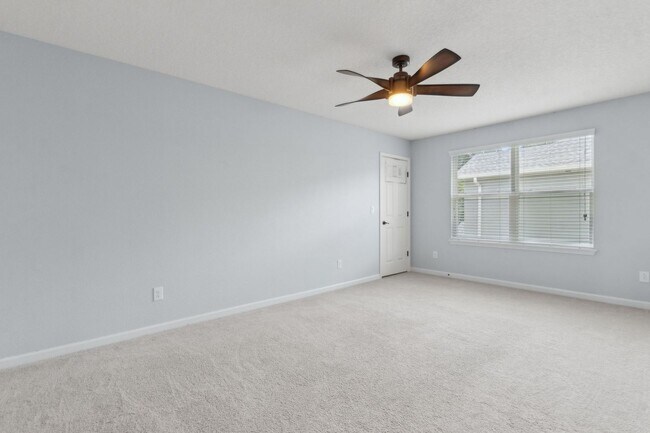 Building Photo - Spacious 4-Bedroom Home in Amelia Walk wit...