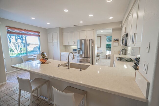 Building Photo - Stunning 4-Bedroom Home with Downstairs Bed/Bath, Views, and Remodeled Kitchen!