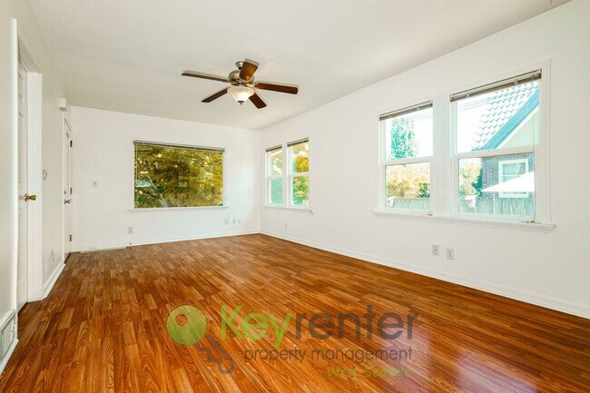 Building Photo - Bright, Versatile 4-Bedroom with Bonus Roo...