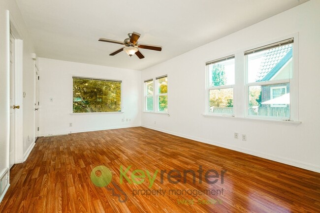 Building Photo - Versatile 4-Bedroom with Patio, Parking, a...
