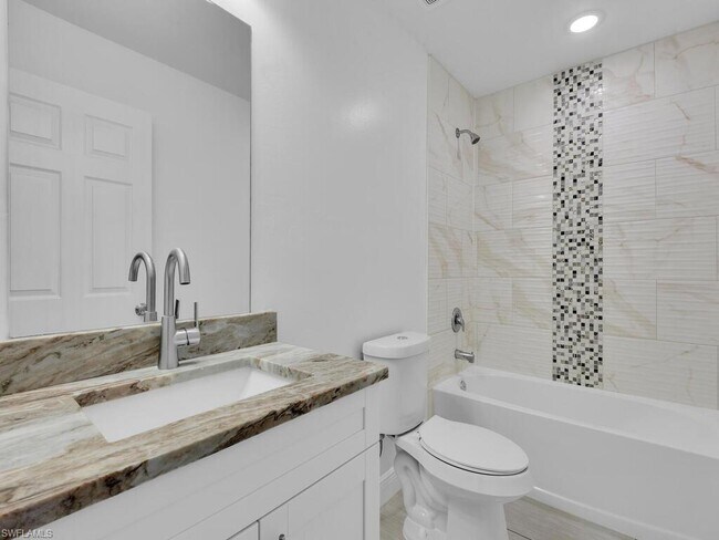 Building Photo - 716 Harry Ave S