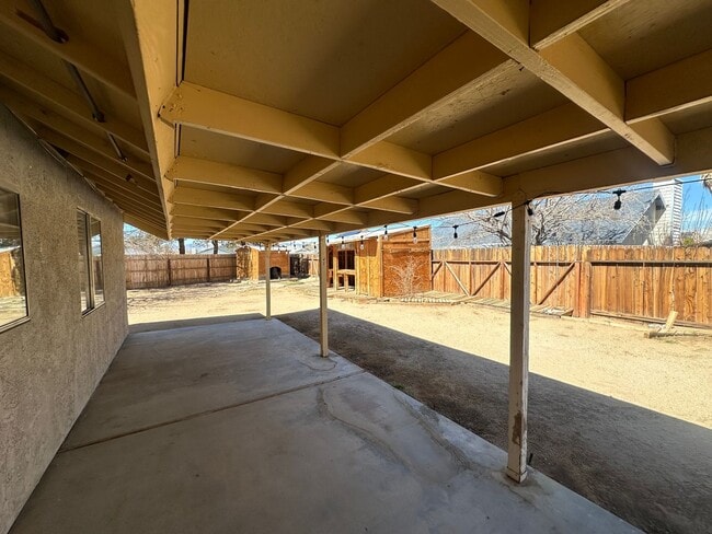 Building Photo - Your Dream Home: Spacious Interiors, Garage, and Huge Backyard