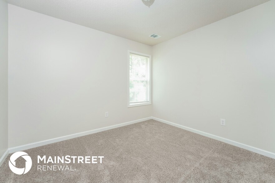 Building Photo - 6930 Red Bone Way