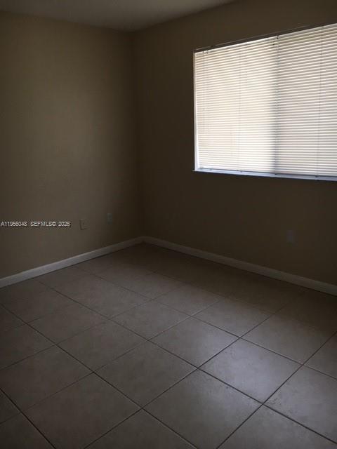 Building Photo - 7095 NW 173rd Dr