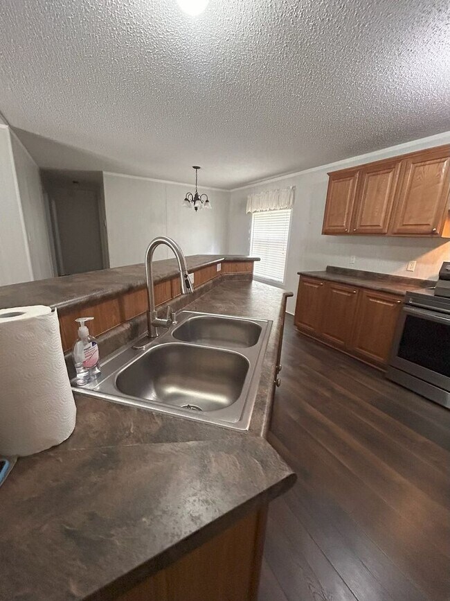 Building Photo - Immaculate 4BR Mobile Home in the heart of...