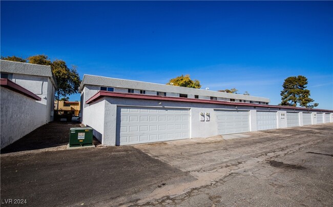 Building Photo - 319 E Pecos Way