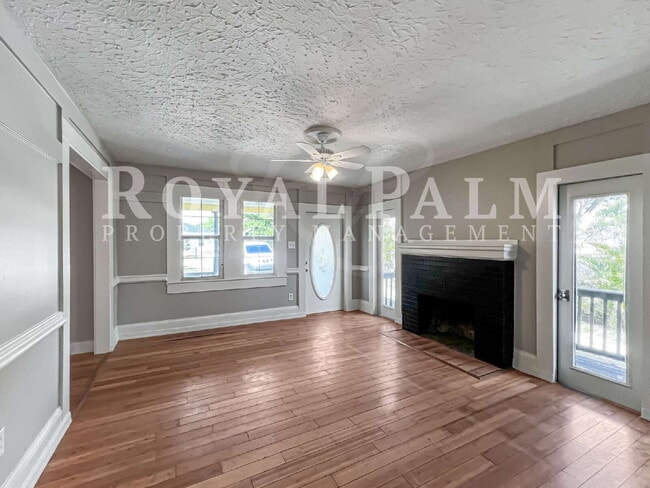 Building Photo - Deck the halls or the French doors, because this charming century-old single family home is avail...