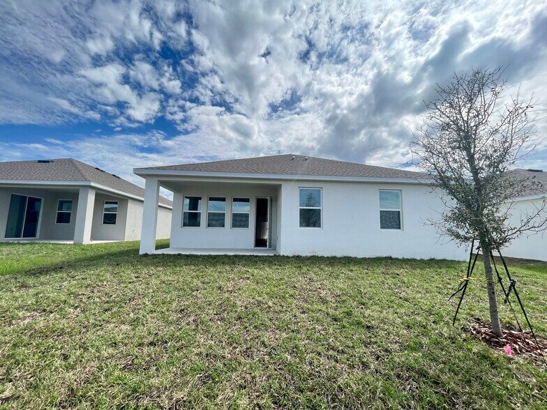 Back Exterior - 1424 Brentwood Dr