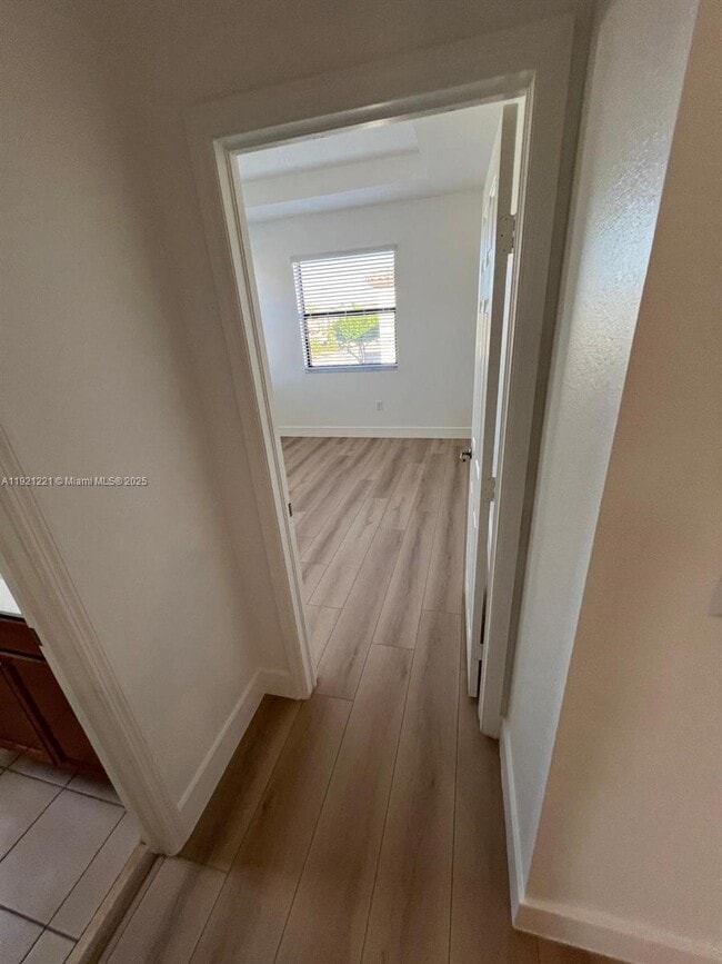 Building Photo - 9399 W 33rd Ln