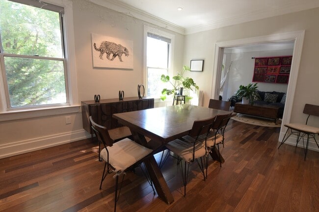 Building Photo - Charming 2BR + home office Condo in the he...