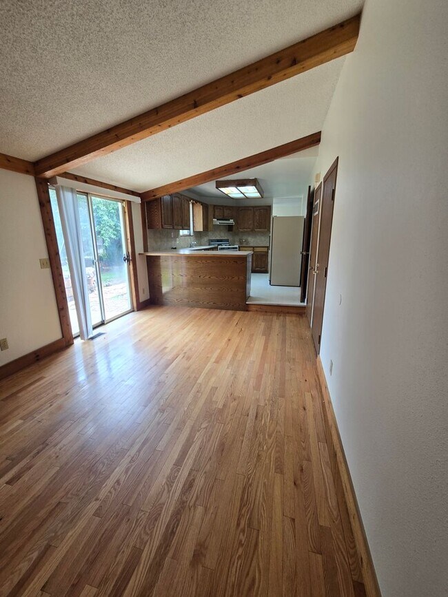Building Photo - 3409 E 99th Dr