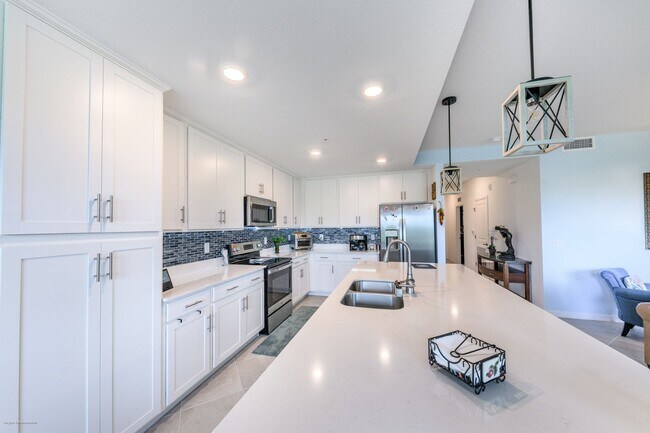 Building Photo - PET FRIENDLY- TURNKEY FURNISHED. VARIABLE RENTAL RATES