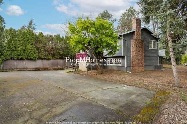 Building Photo - Secluded Nature Retreat: 4 Bedrooms!