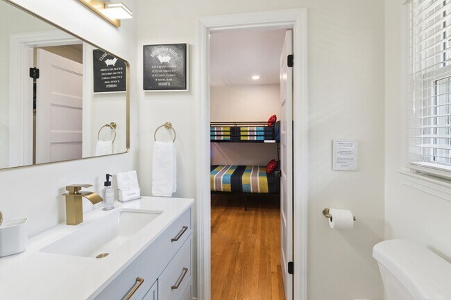 Building Photo - Fully Furnished: Beautiful 4-Bedroom Home ...
