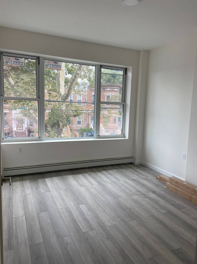 Building Photo - 7118-7110 10th Ave