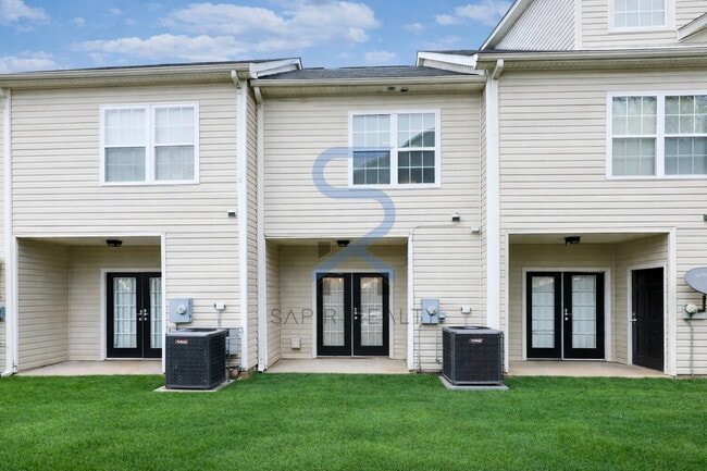 Building Photo - Move in before February 28th and choose your reward: a $250 Amazon Gift Card or a 55" Smart TV!