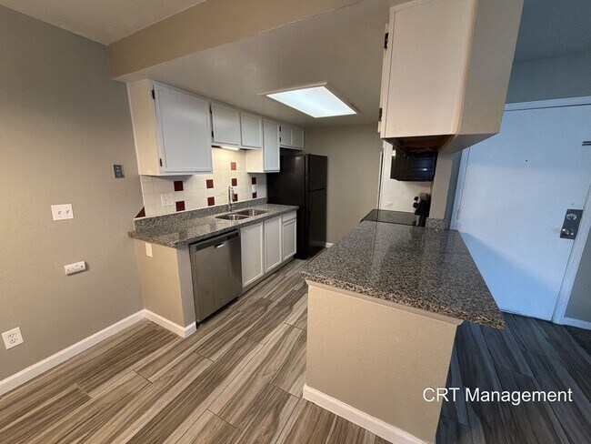 Building Photo - Spacious 3-Bedroom Condo with In-Unit Laundry – Convenient Aurora Location