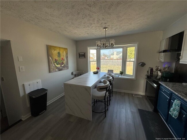 Building Photo - 7891 Uriah Dr