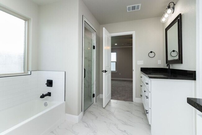 Building Photo - Available with our Lease with Purchase Option Program!