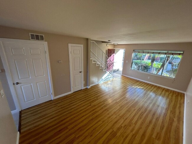 Building Photo - 2 Bedroom 1.5 Bath Townhome. Gated Community. Upgraded & 2 Parking Spaces