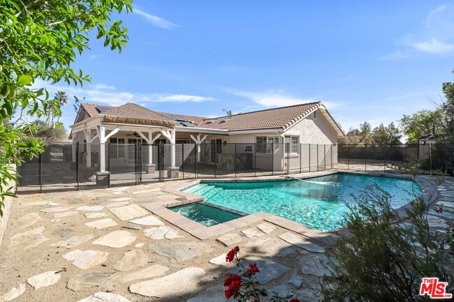 Building Photo - 10945 Cozycroft Ave