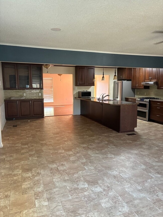Building Photo - Chef's Kitchen! Large Home on Corner Lot with Spacious Fenced Yard