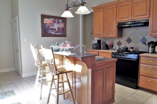 Building Photo - Location and upgrades! 3BR/2BA dbl garage, tons of storage, no carpet!