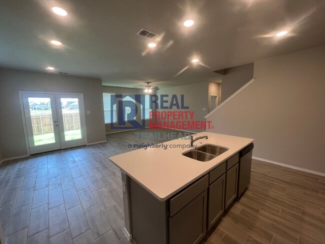 Building Photo - Striking 3 Bedroom/3 Bath Open Concept Hom...
