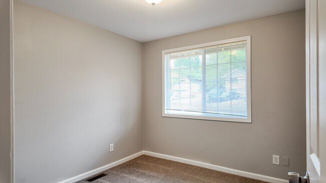 Building Photo - Charming 3BR Home with Massive Fenced in Yard