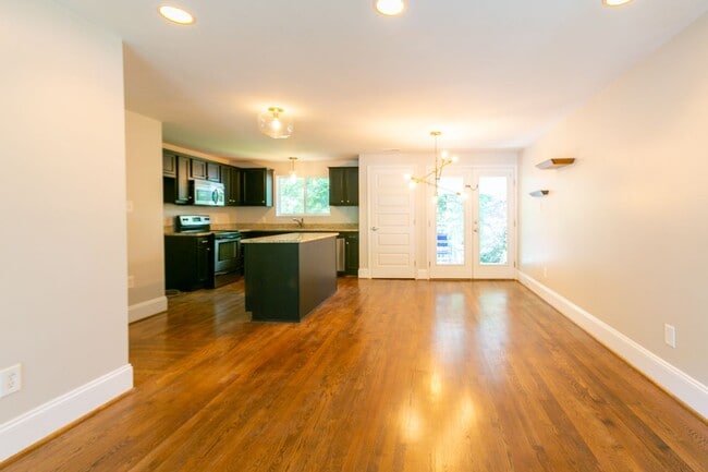 Building Photo - **Application pending 5/1/2026**Stunning Carrboro Condo available early June!