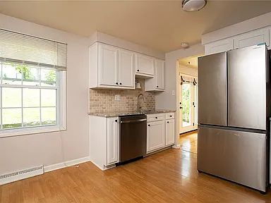 Building Photo - Charming 4-Bed Retreat with Finished Basem...