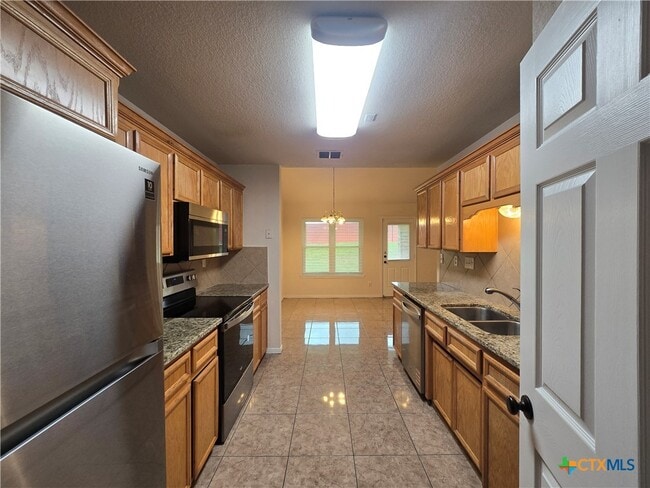 Building Photo - 5705 Mandalay Dr