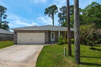 Building Photo - "Charming 3-Bed Home in Mary Esther with $200.00 Off First Full Month's Rent!"
