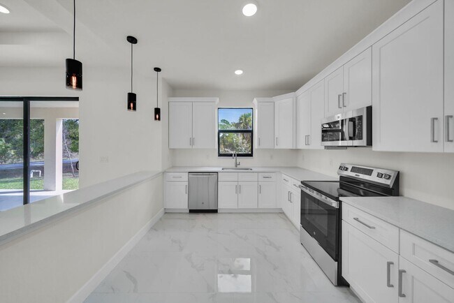 Building Photo - Be the first in occupy this 2026 constructed home in the city of Port Charlotte FL! Qualify for a...