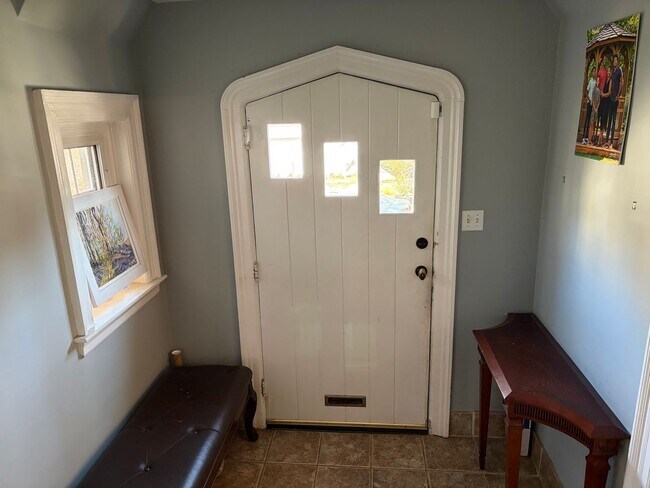 Building Photo - Elegant 3 Story Brick Corner Property Now Available