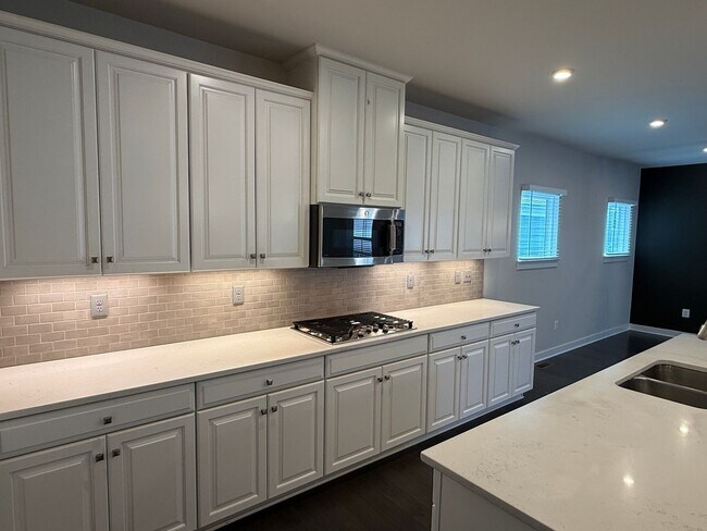 Building Photo - Stunning Greenleigh Home with 4 Bedrooms, 4.5 Baths & Designer Kitchen